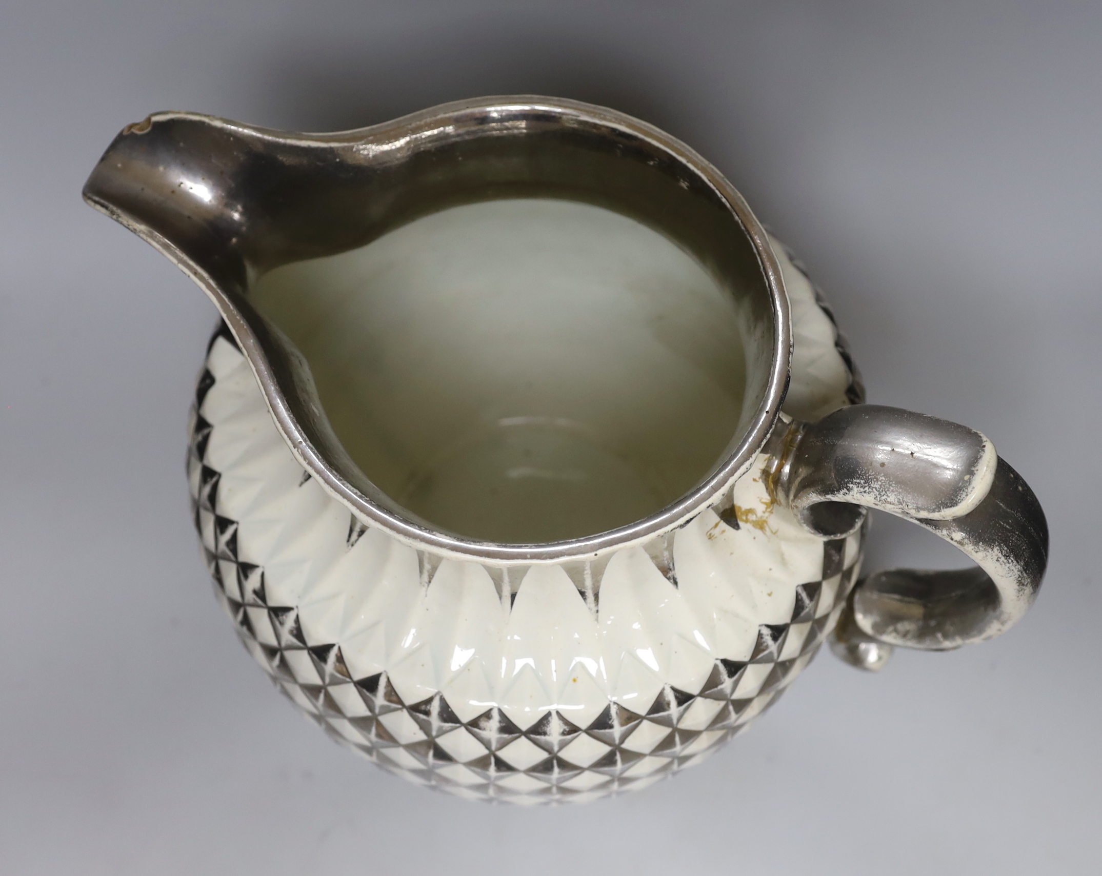 A massive early 19th century Staffordshire pineapple moulded silver lustre large jug, 33cm